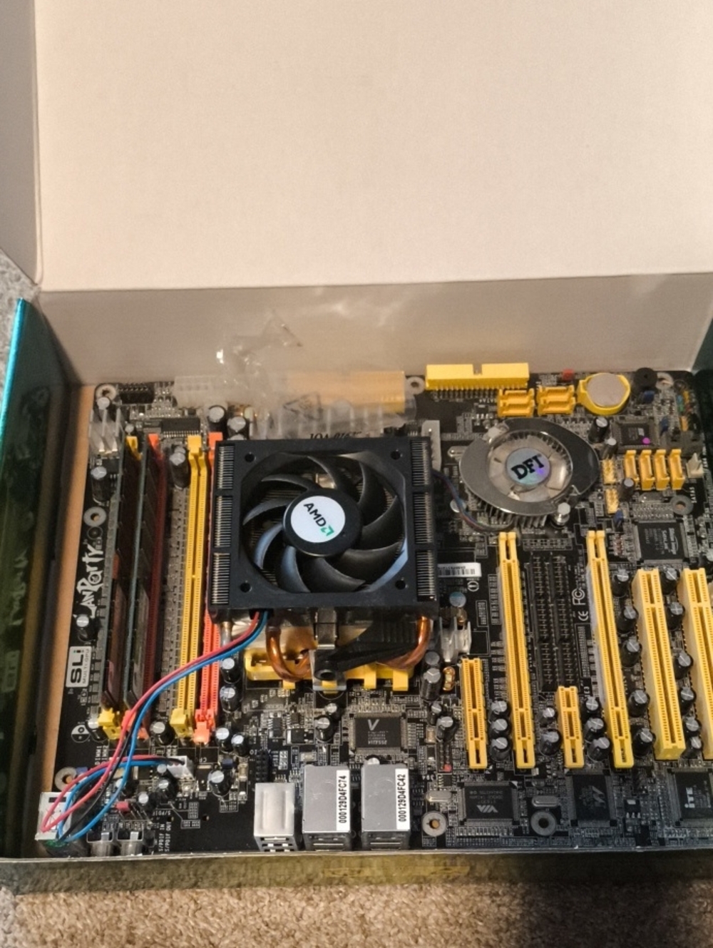 AMD Black CPU Cooler Motherboard with Yellow Expansion Slots Read The Descriptio